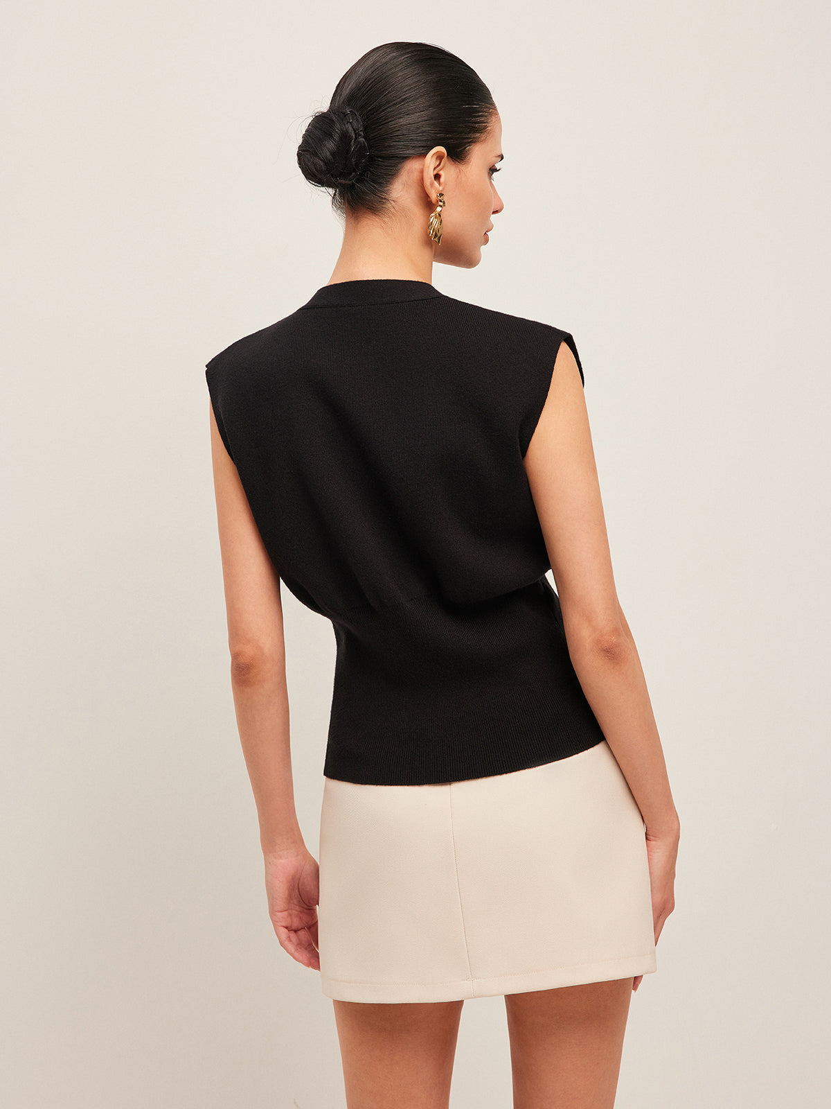 Gilet sans manches à un bouton
